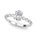 Oval Center Ring with Smaller Round Stones Along the Shank - Diamonds By Rothschild