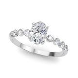 Oval Center Ring with Smaller Round Stones Along the Shank - Diamonds By Rothschild