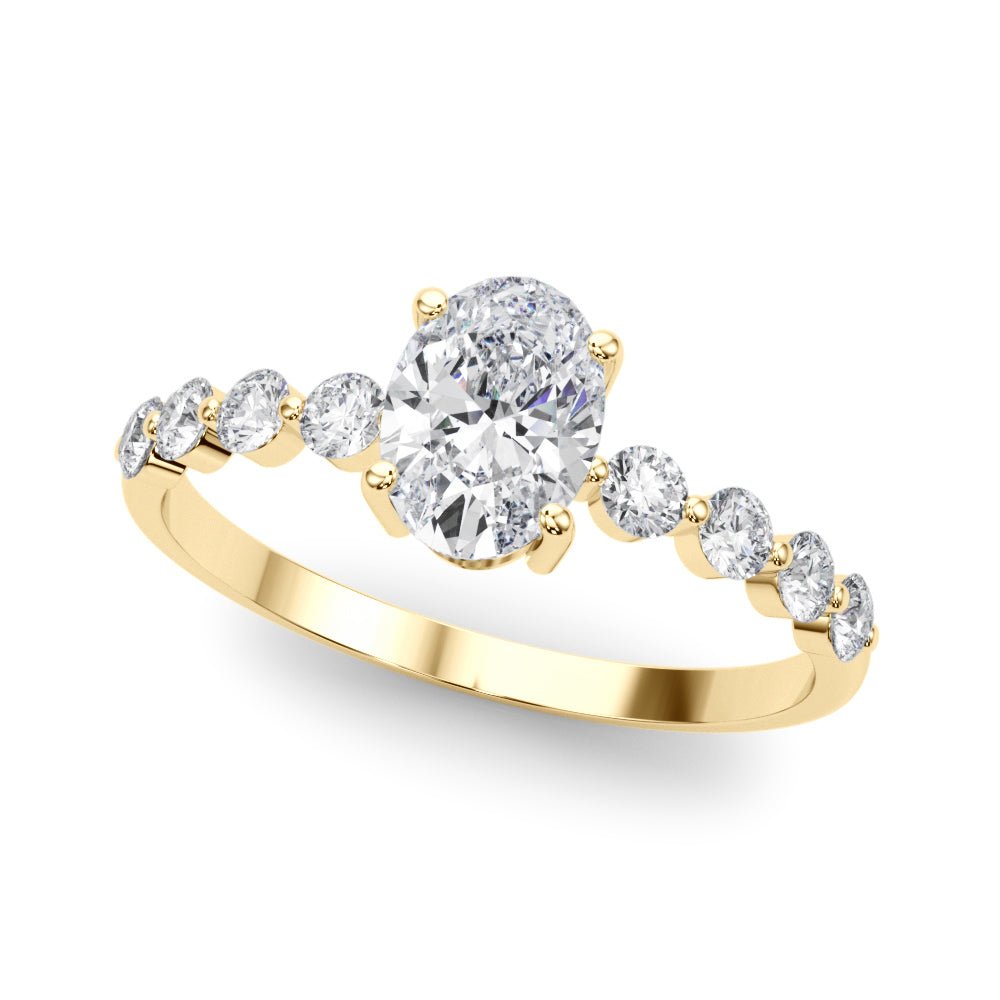 Oval Center Ring with Smaller Round Stones Along the Shank - Diamonds By Rothschild
