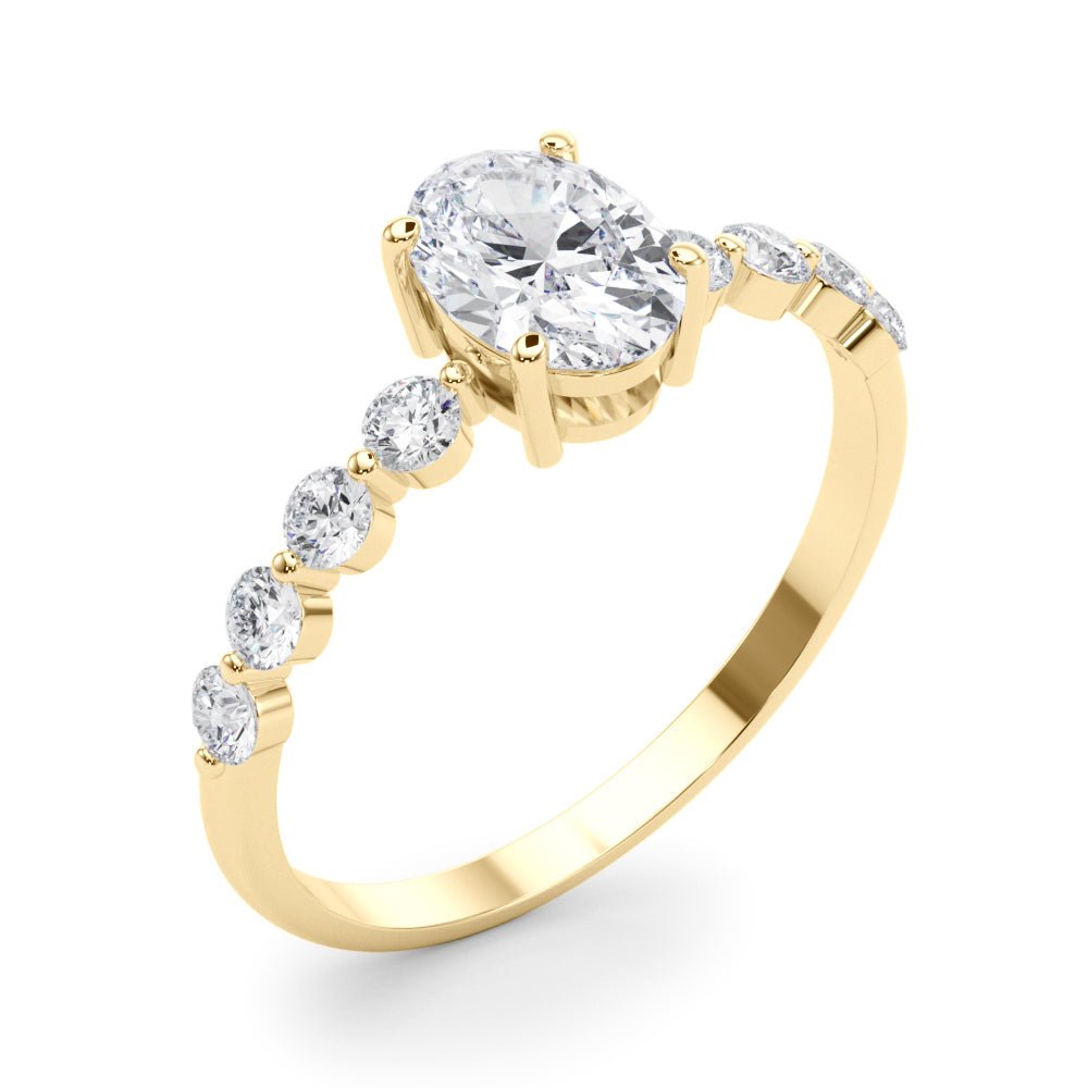 Oval Center Ring with Smaller Round Stones Along the Shank - Diamonds By Rothschild